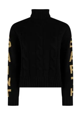 Maglia collo alto con decorazione sulle maniche.